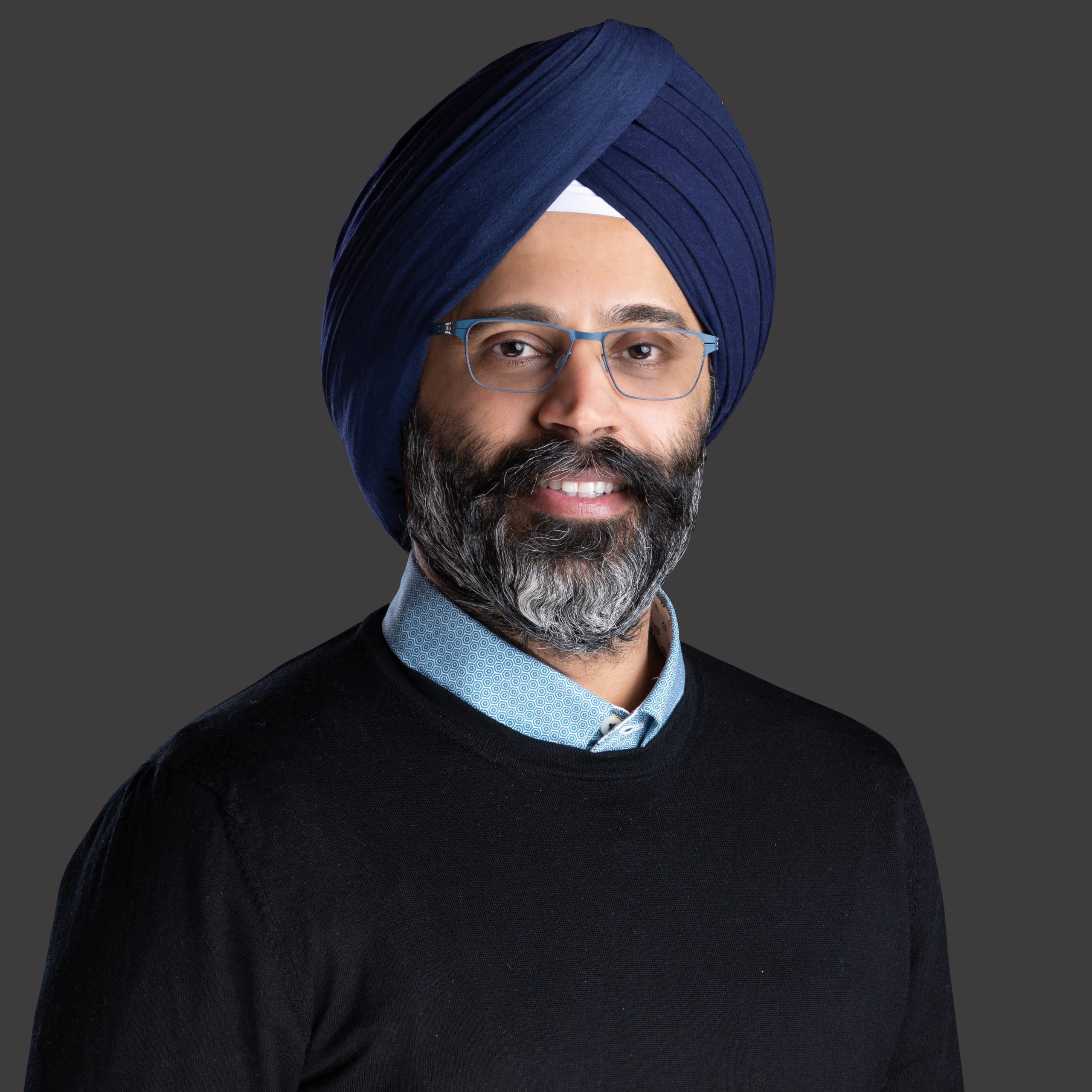 Portrait officiel de Karandeep Anand, nommé directeur technologique de Disney après avoir dirigé Character.AI.
